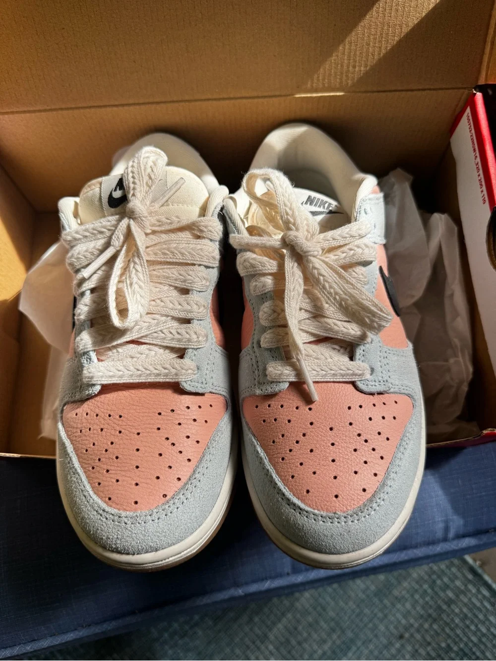 Woman’s Nike Dunk Low-Top Sneakers in Peach/blue with braided laces